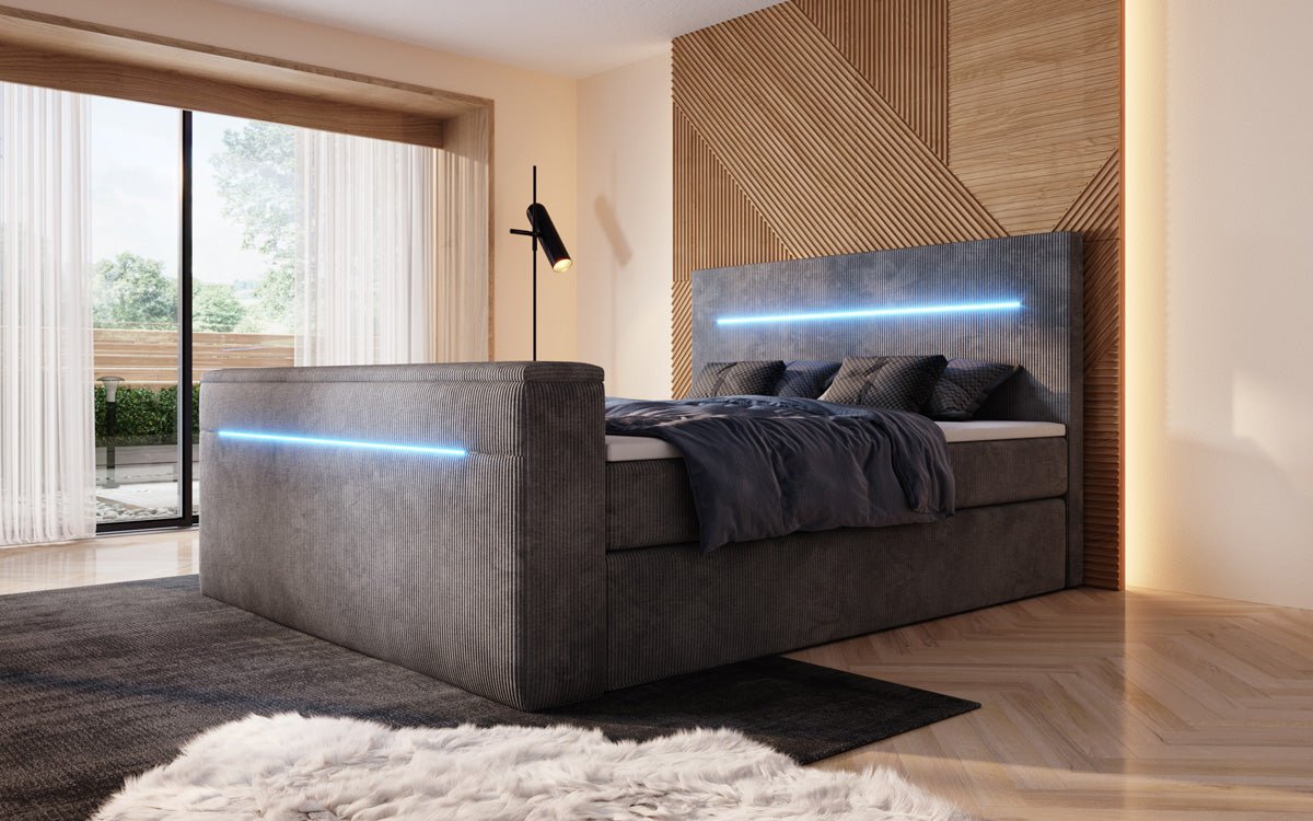 Boxspringbett Sejour mit TV Lift, RGB und Stauraum in Cord
