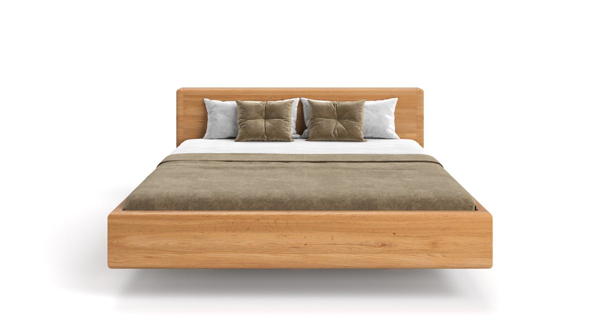 Designer Holzbett Arvelo aus massiver Eiche in Schwebeoptik und geraden Headboard