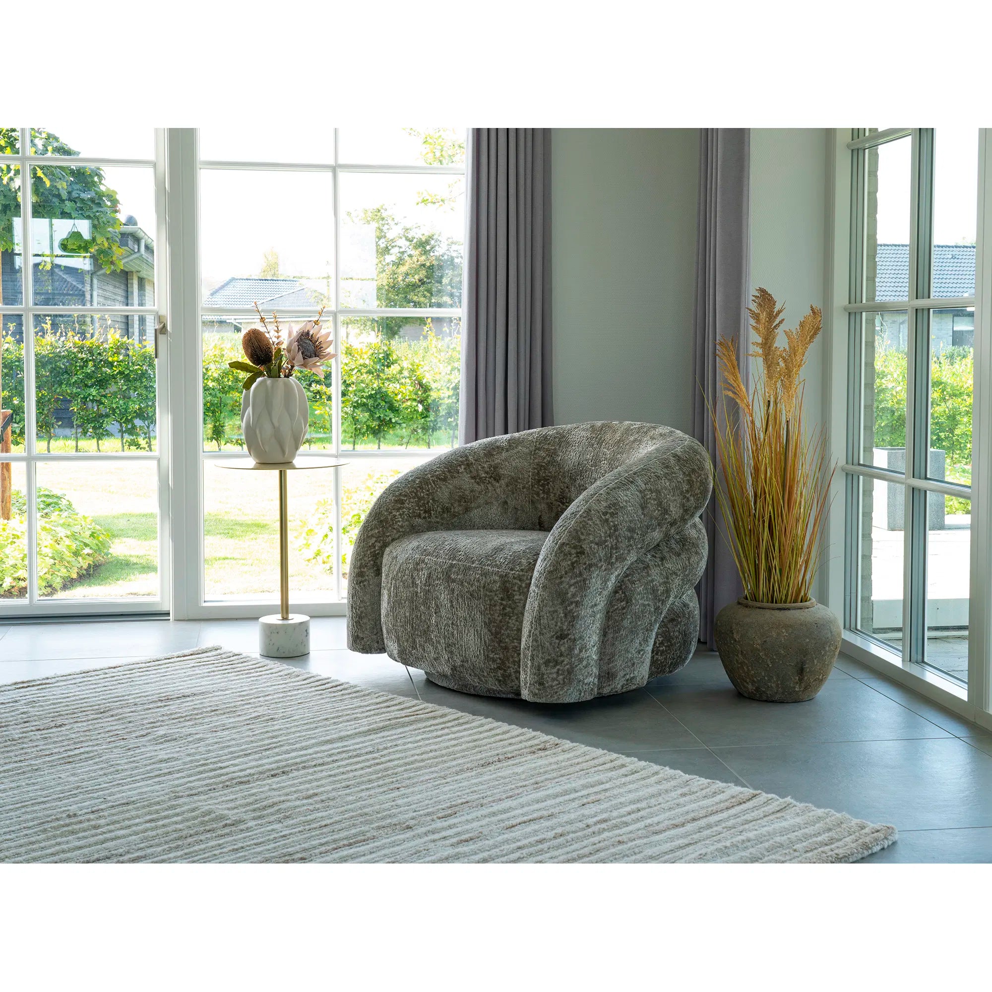 Designer sofa armchair Korfu with swivel function in sand bouclé
