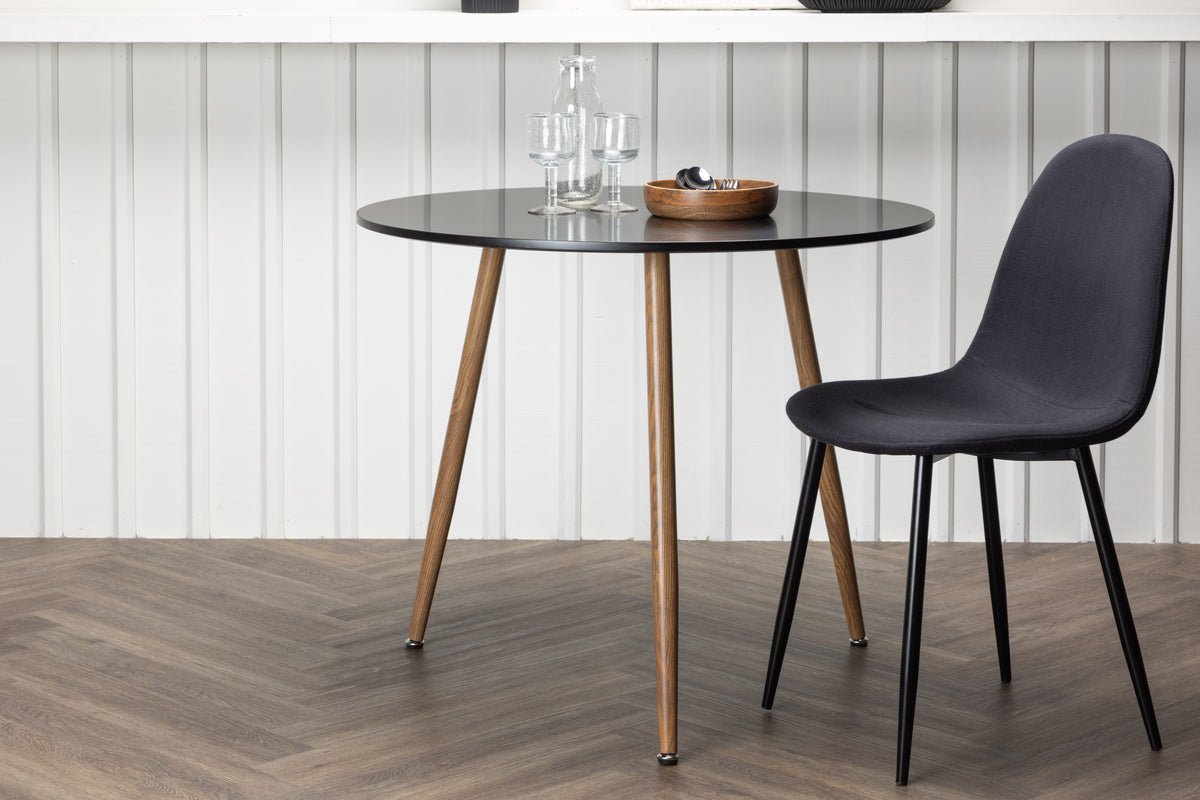 Dining table Koa - round shape and stylish coloring