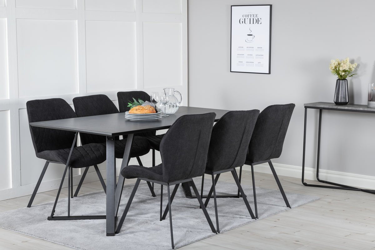 Dining table Waka - the decorative metal legs set a stylish accent