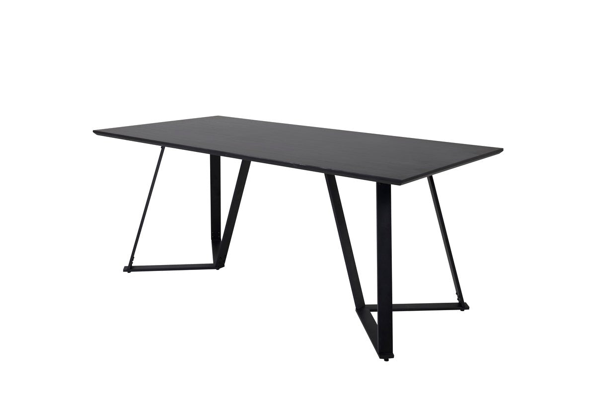 Dining table Waka - the decorative metal legs set a stylish accent