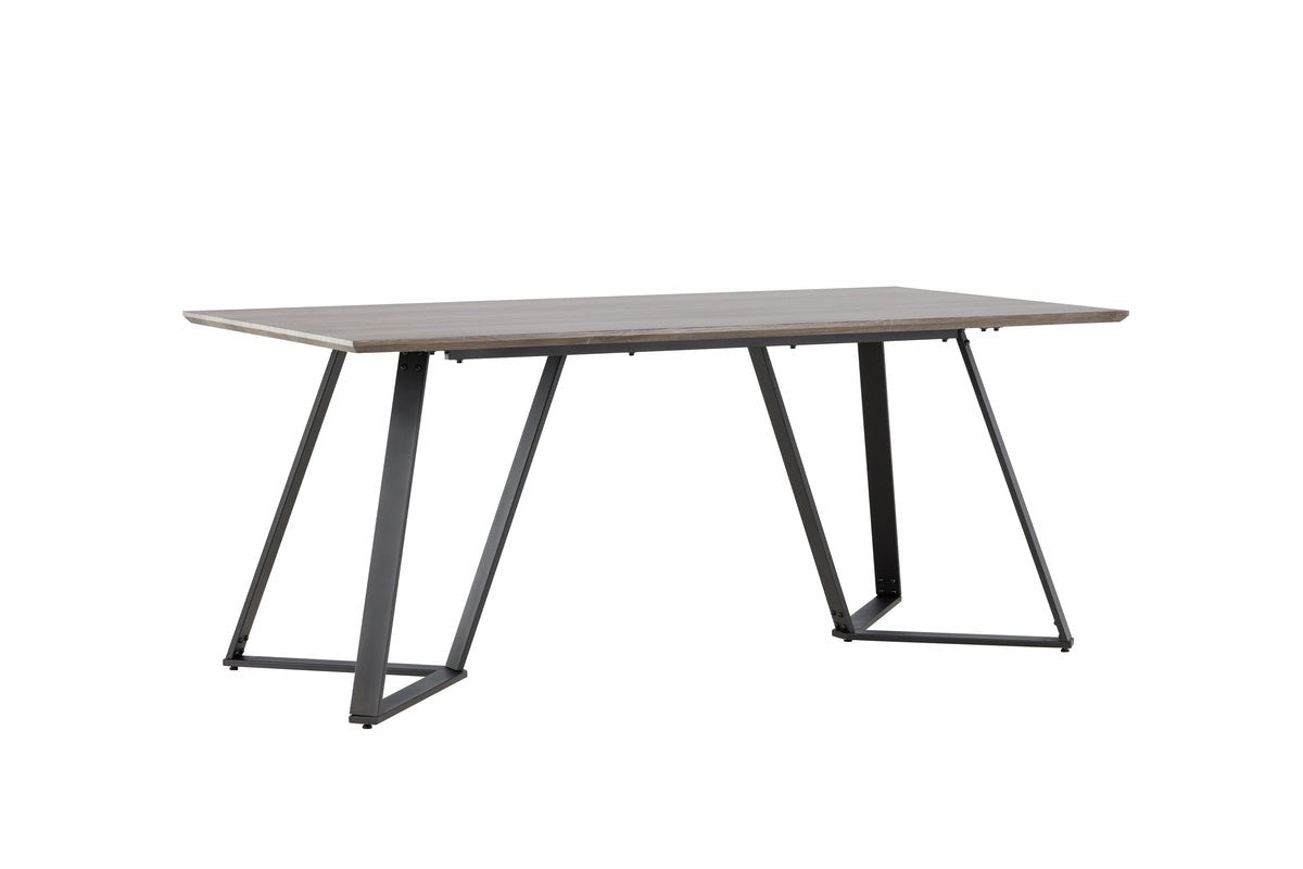Dining table Waka - the decorative metal legs set a stylish accent