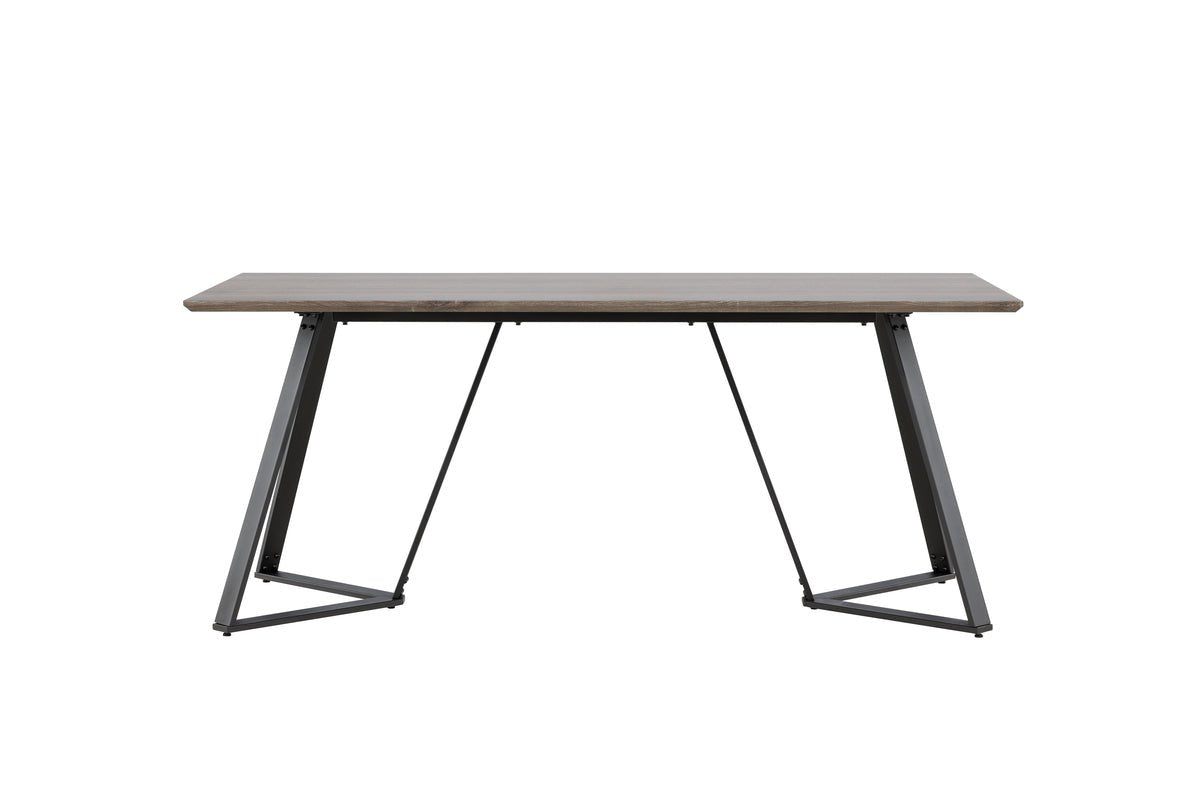 Dining table Waka - the decorative metal legs set a stylish accent