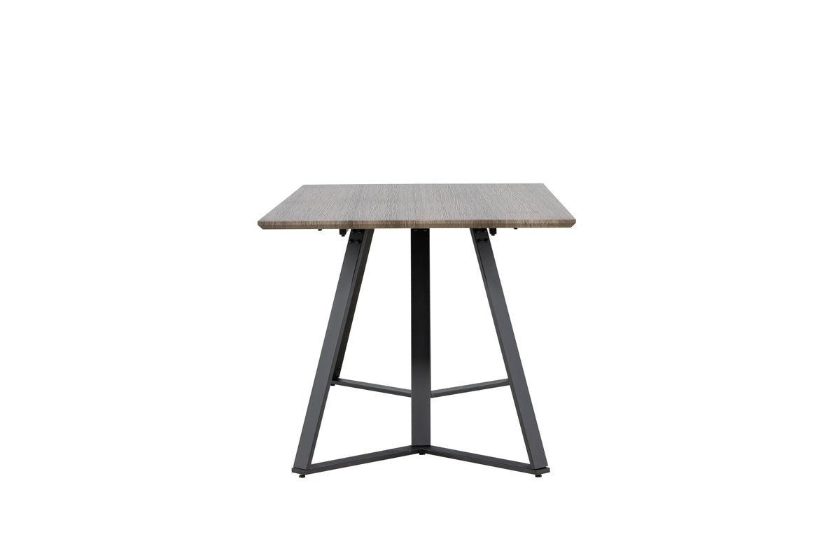 Dining table Waka - the decorative metal legs set a stylish accent