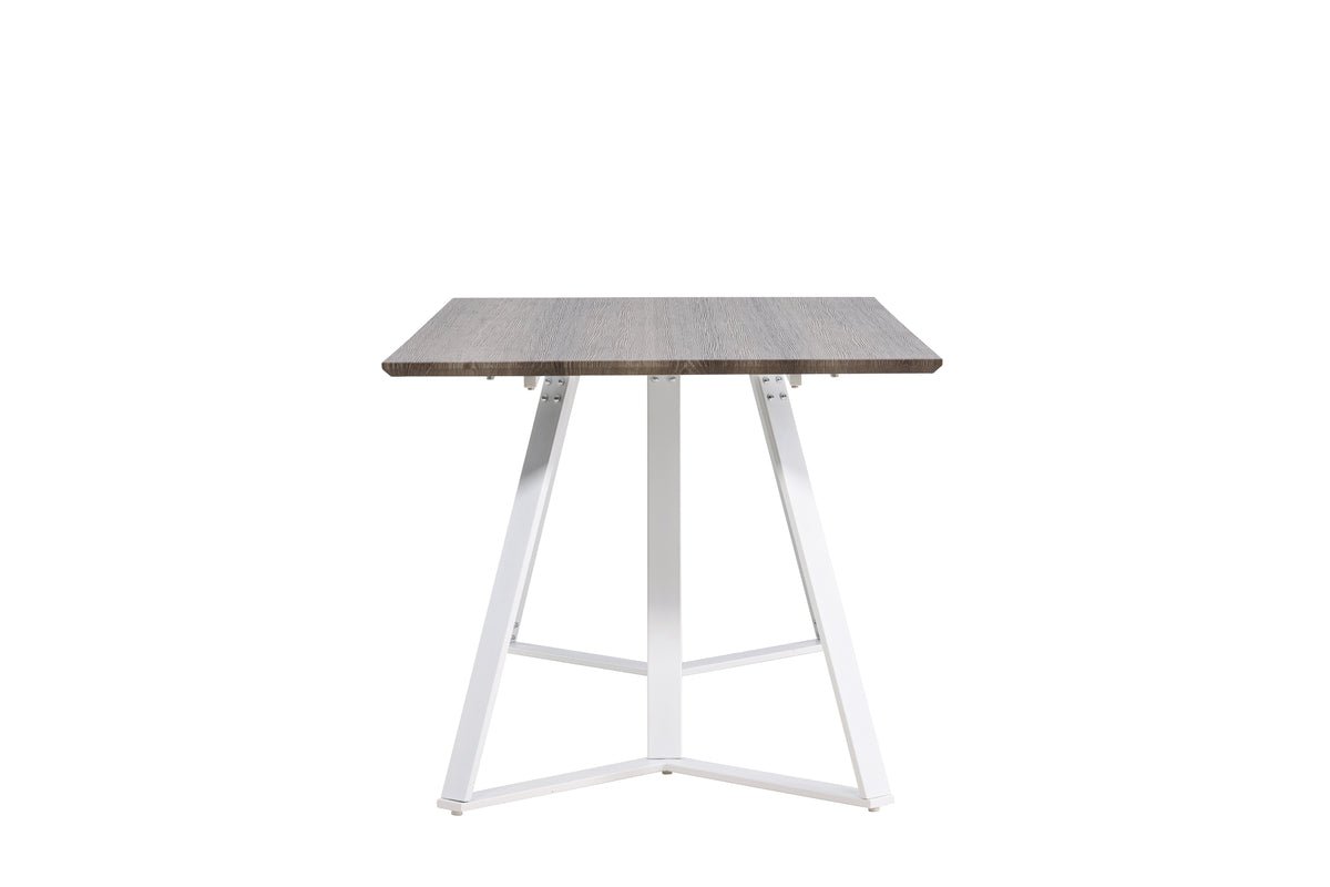 Dining table Waka - the decorative metal legs set a stylish accent