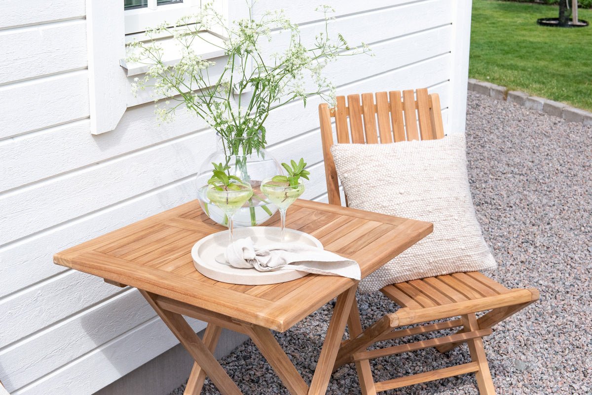 Garden table Siana - a square dining table made of teak wood