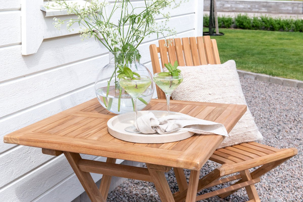 Garden table Siana - a square dining table made of teak wood