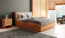 Designer wooden bed Cassian made of solid oak with storage space