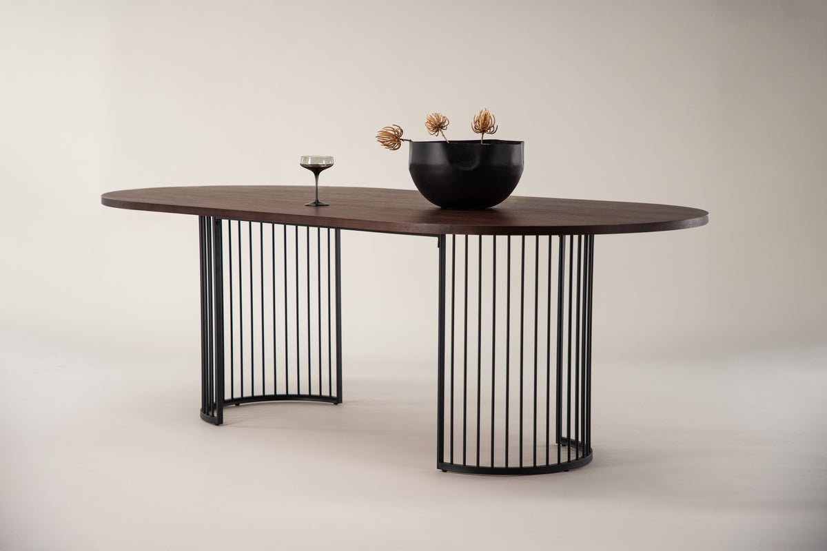 Manolo dining table - oval dining table with Black tabletop and walnut