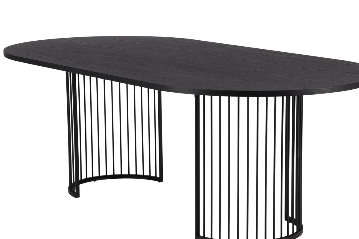 Manolo dining table - oval dining table with Black tabletop and walnut