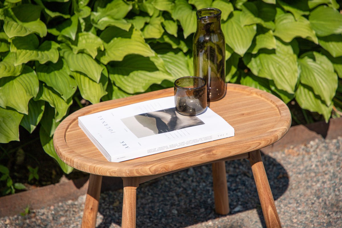 Garden table Maji - a side table in oval shape made of teak wood