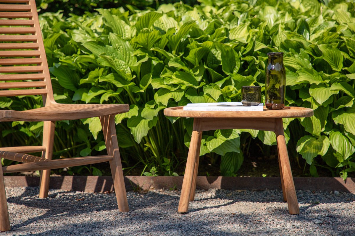 Garden table Maji - a side table in oval shape made of teak wood