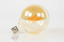 LED Incandescent Bulb Veya – G125-E27 in Large Format with Amber-Colored Glass