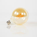 LED Incandescent Bulb Veya – G125-E27 in Large Format with Amber-Colored Glass