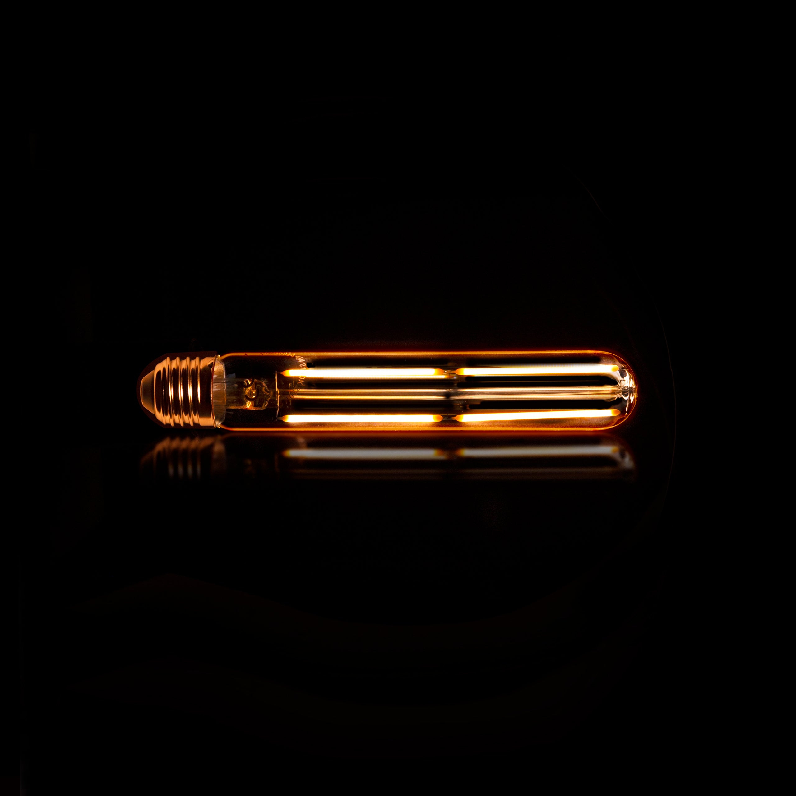 LED incandescent bulb Tavio – T32-E27 in tubular shape with amber-colored glass