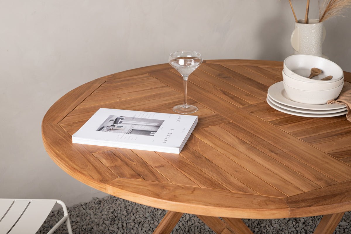 Garden table Oraya - a round dining table made of teak wood