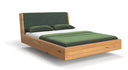 Designer wooden bed Cassian made of solid oak in a floating appearance