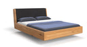 Designer wooden bed Cassian made of solid oak in a floating appearance