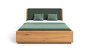 Designer wooden bed Cassian made of solid oak with storage space