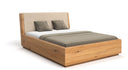 Designer wooden bed Cassian made of solid oak with storage space