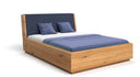 Designer wooden bed Cassian made of solid oak with storage space