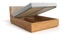 Designer wooden bed Cassian made of solid oak with storage space