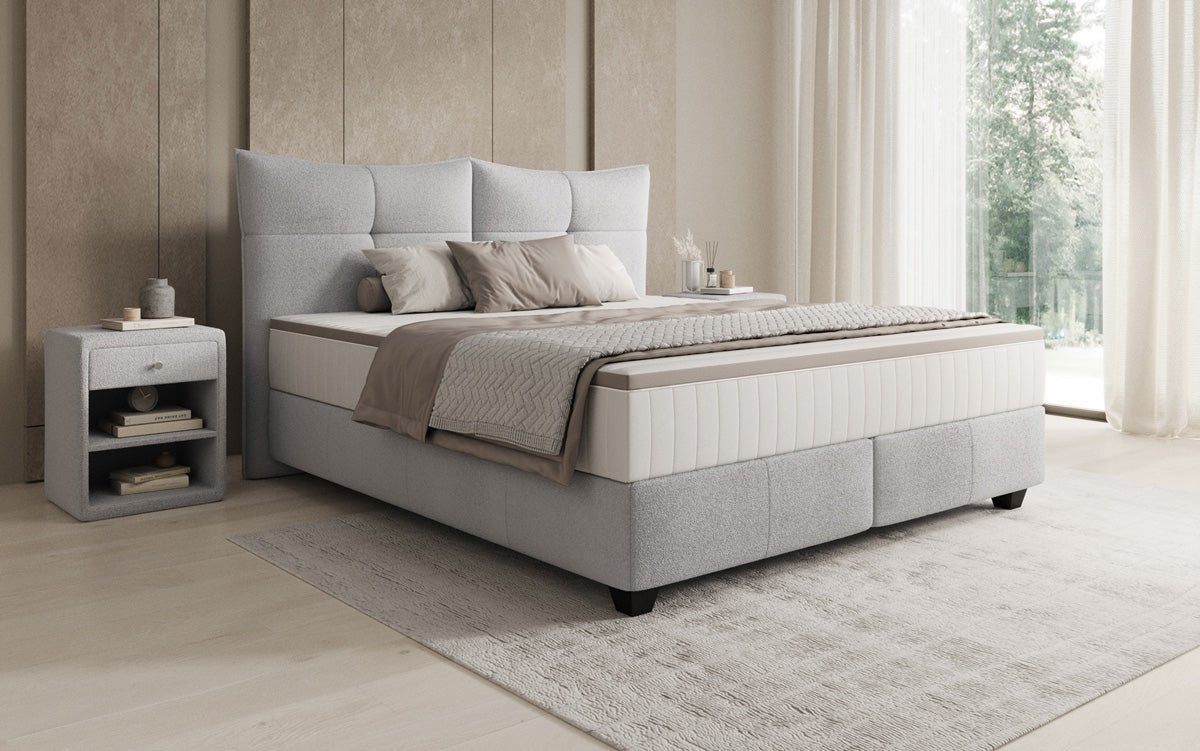 Box spring bed Veyora in bouclé