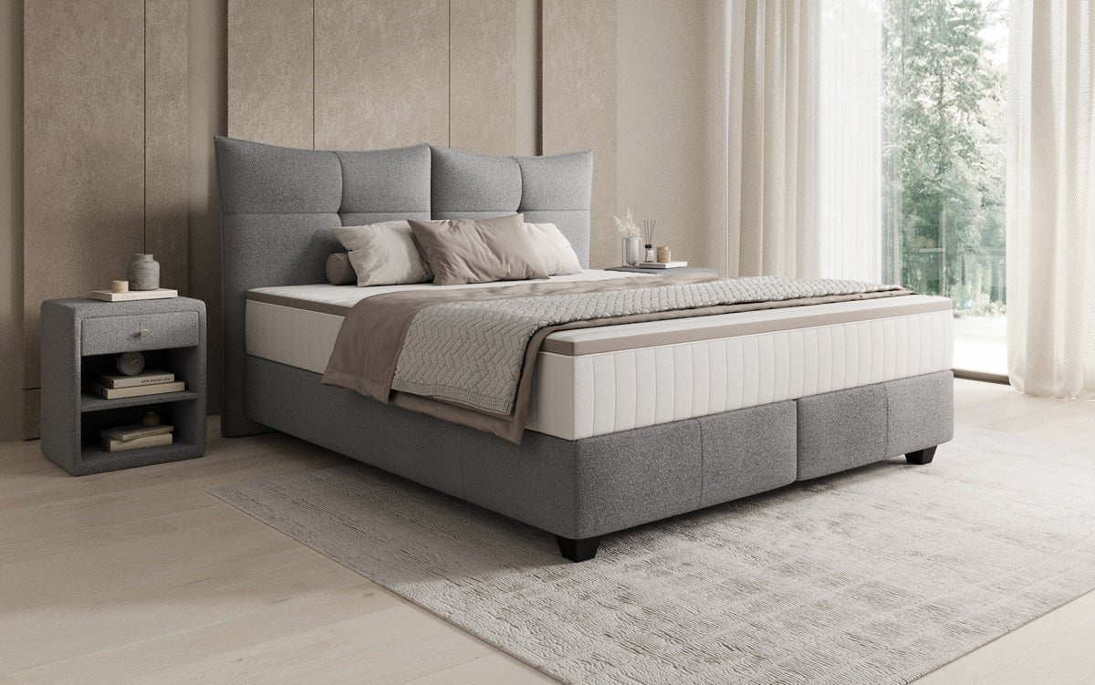 Box spring bed Veyora in bouclé