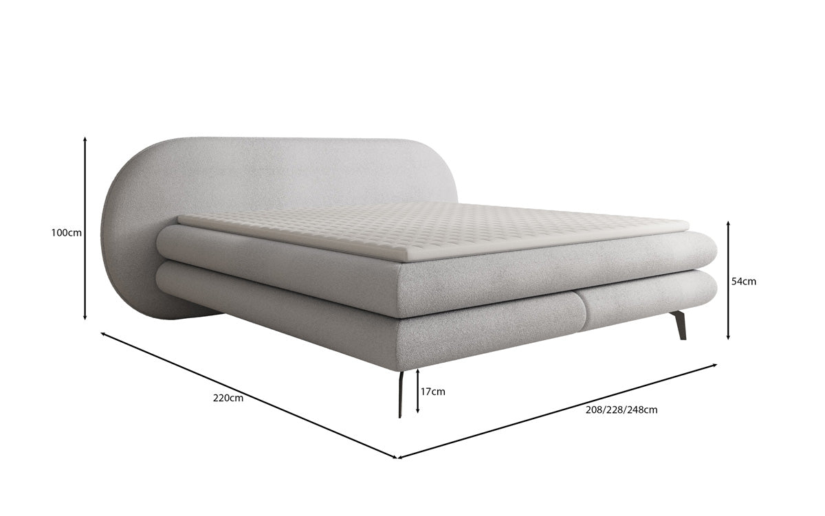 Box spring bed Marisol with oval headboard in bouclé
