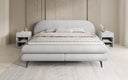 Box spring bed Marisol with oval headboard in bouclé