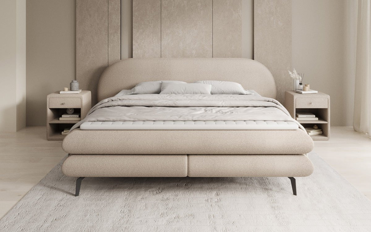 Box spring bed Marisol with oval headboard in bouclé