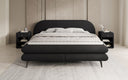 Box spring bed Marisol with oval headboard in bouclé