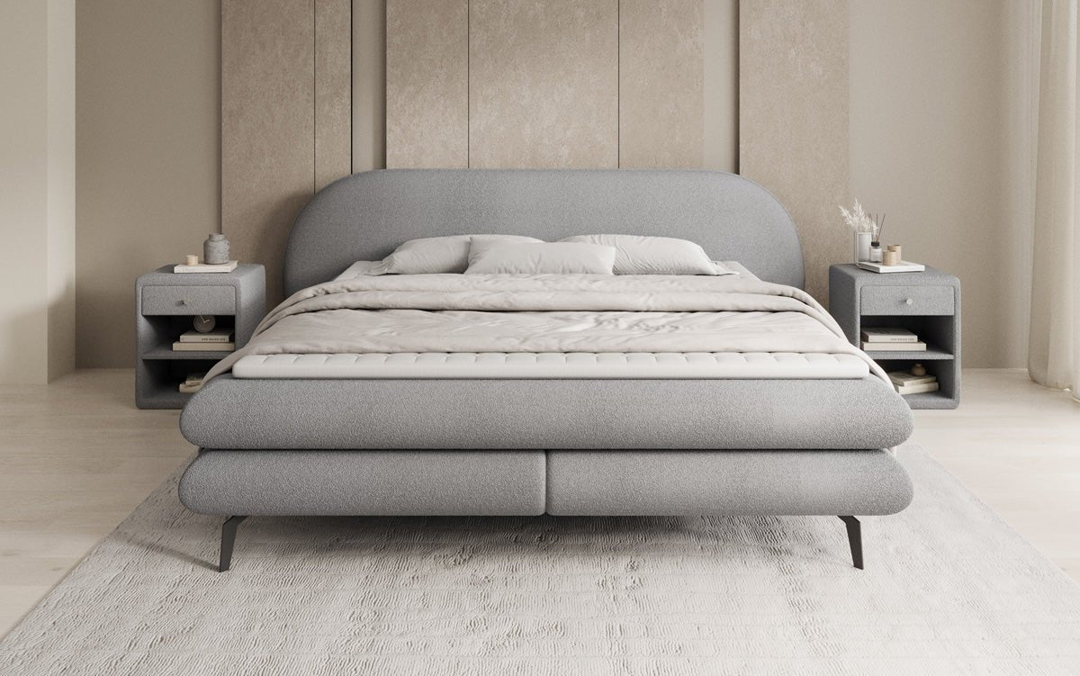 Box spring bed Marisol with oval headboard in bouclé
