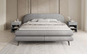 Box spring bed Marisol with oval headboard in bouclé