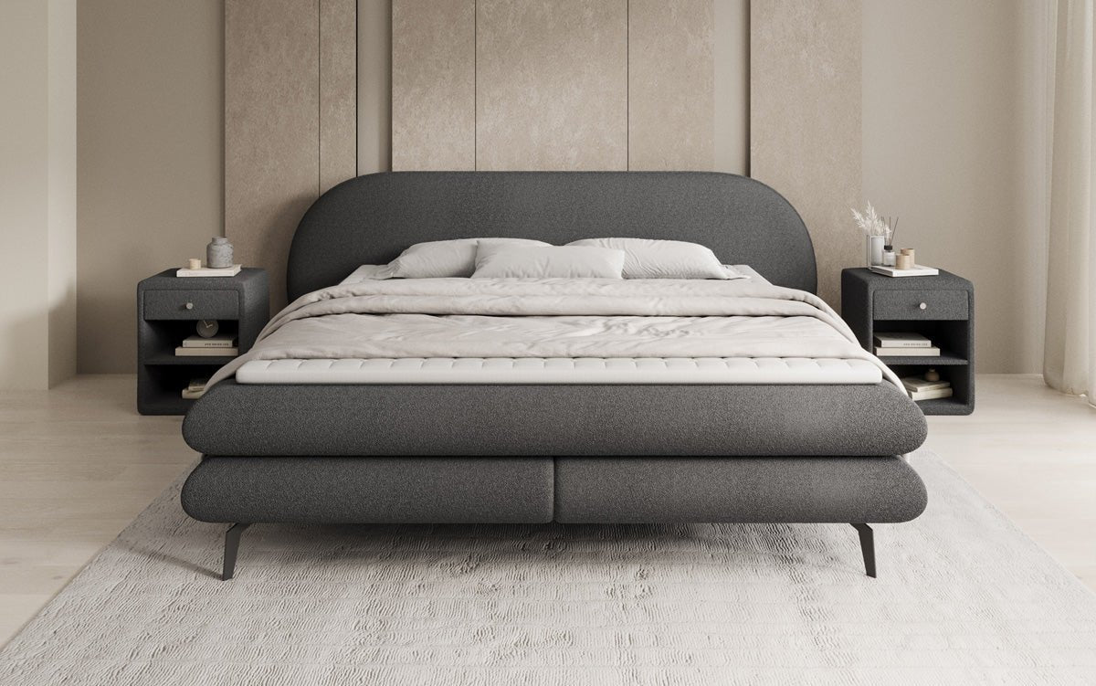 Box spring bed Marisol with oval headboard in bouclé