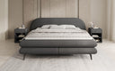 Box spring bed Marisol with oval headboard in bouclé