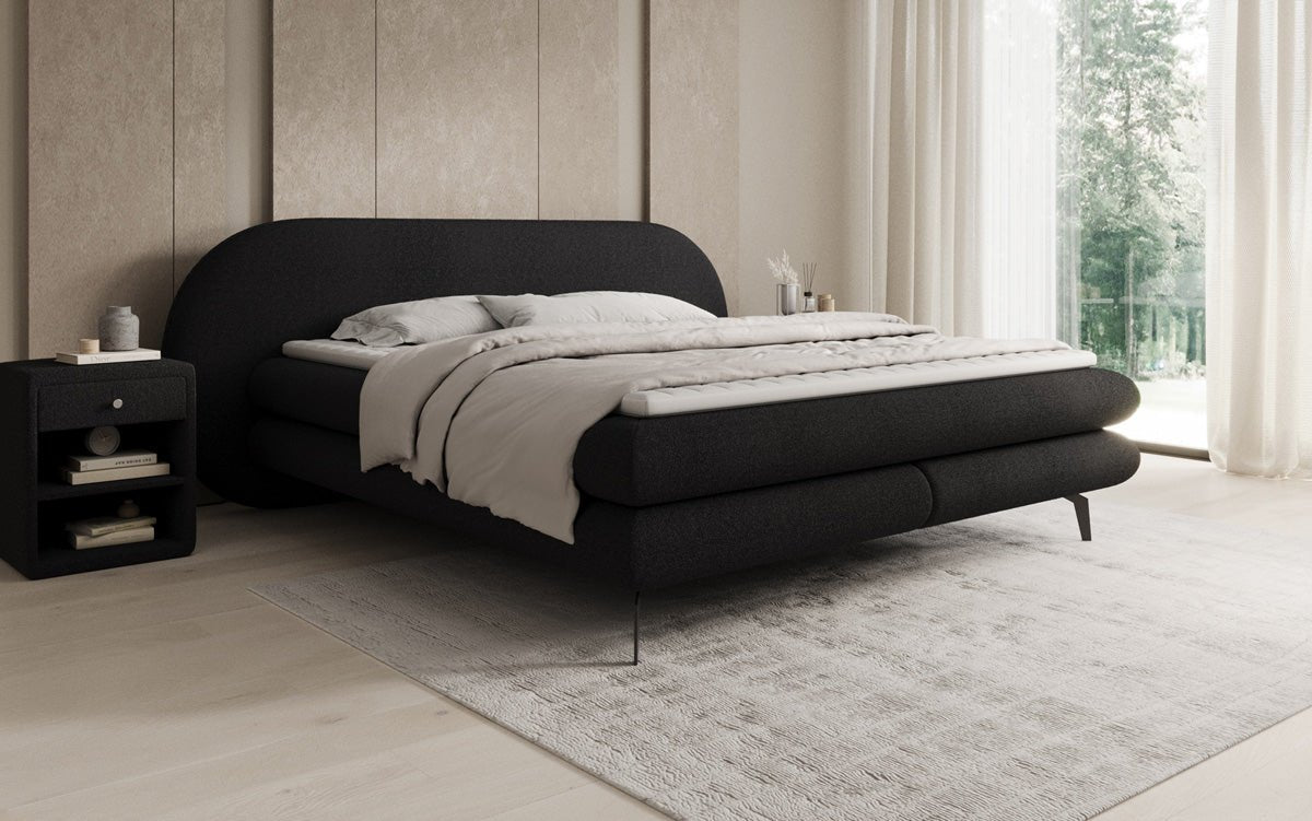 Box spring bed Marisol with oval headboard in bouclé