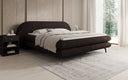 Box spring bed Marisol with oval headboard in bouclé