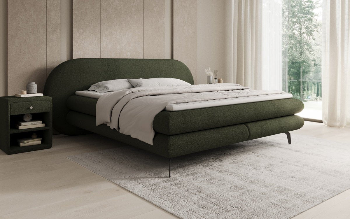 Box spring bed Marisol with oval headboard in bouclé