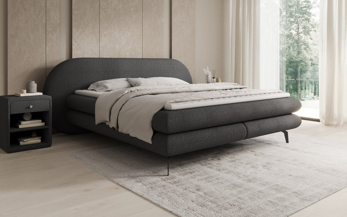 Box spring bed Marisol with oval headboard in bouclé