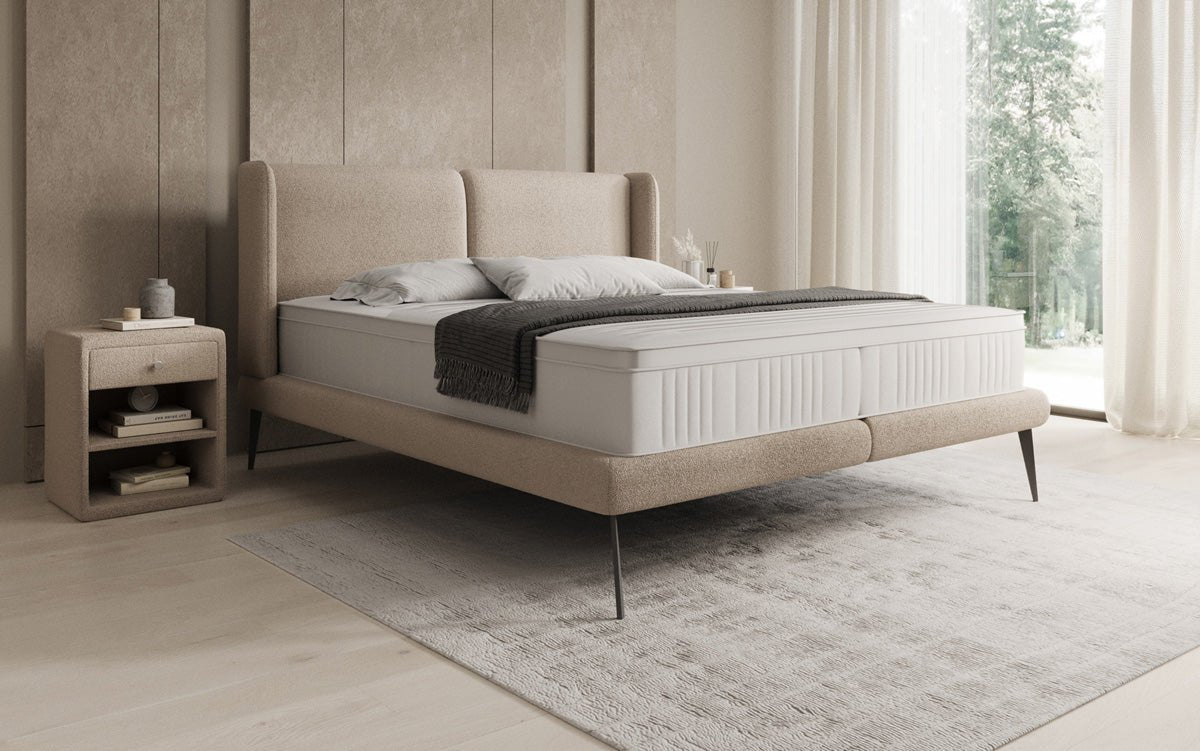 Upholstered bed Avendra in Bouclé