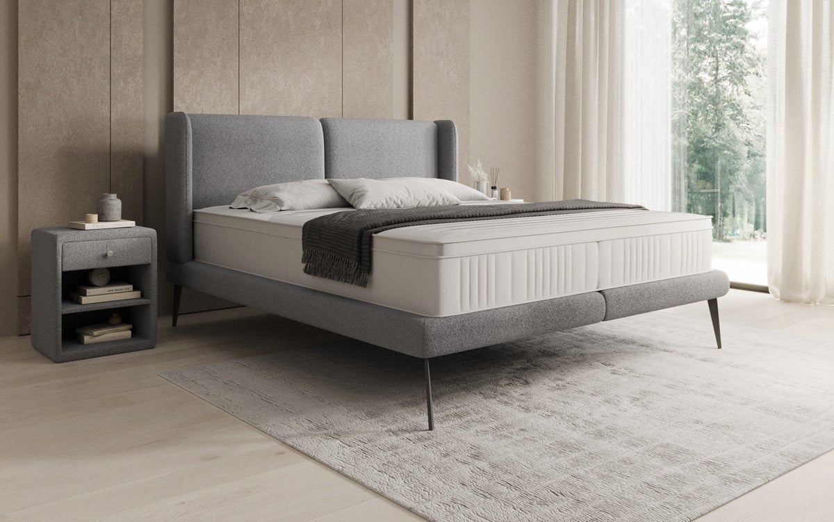 Upholstered bed Avendra in Bouclé