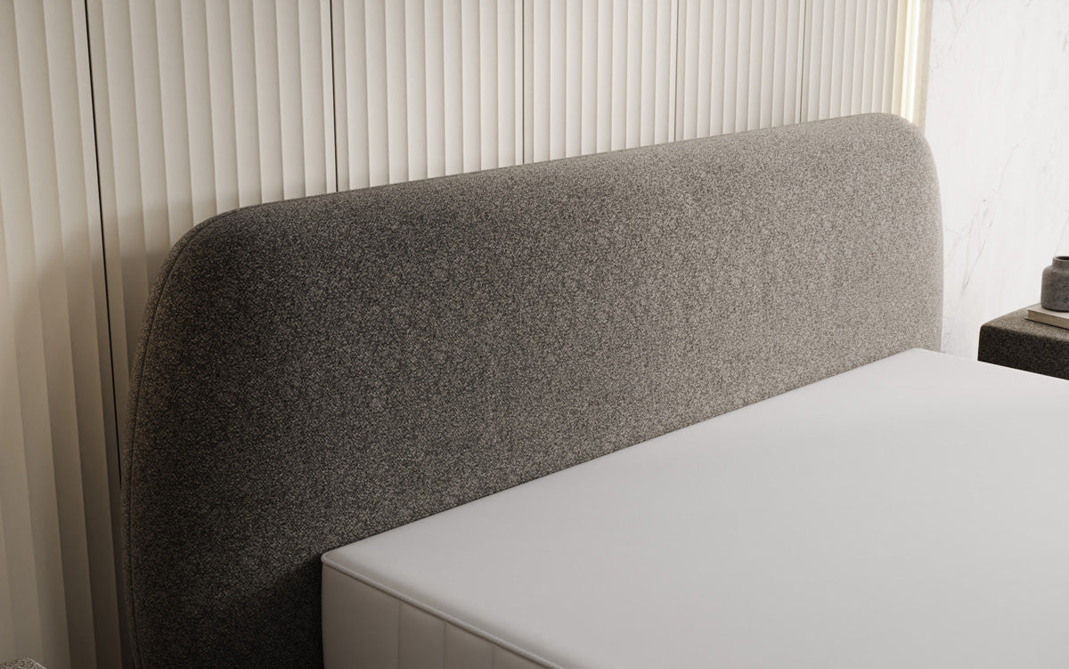 Designer upholstered bed Nella in textured fabric with storage space