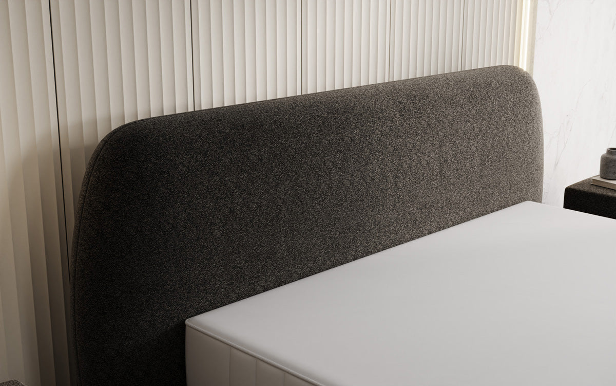 Designer upholstered bed Nella in textured fabric with storage space