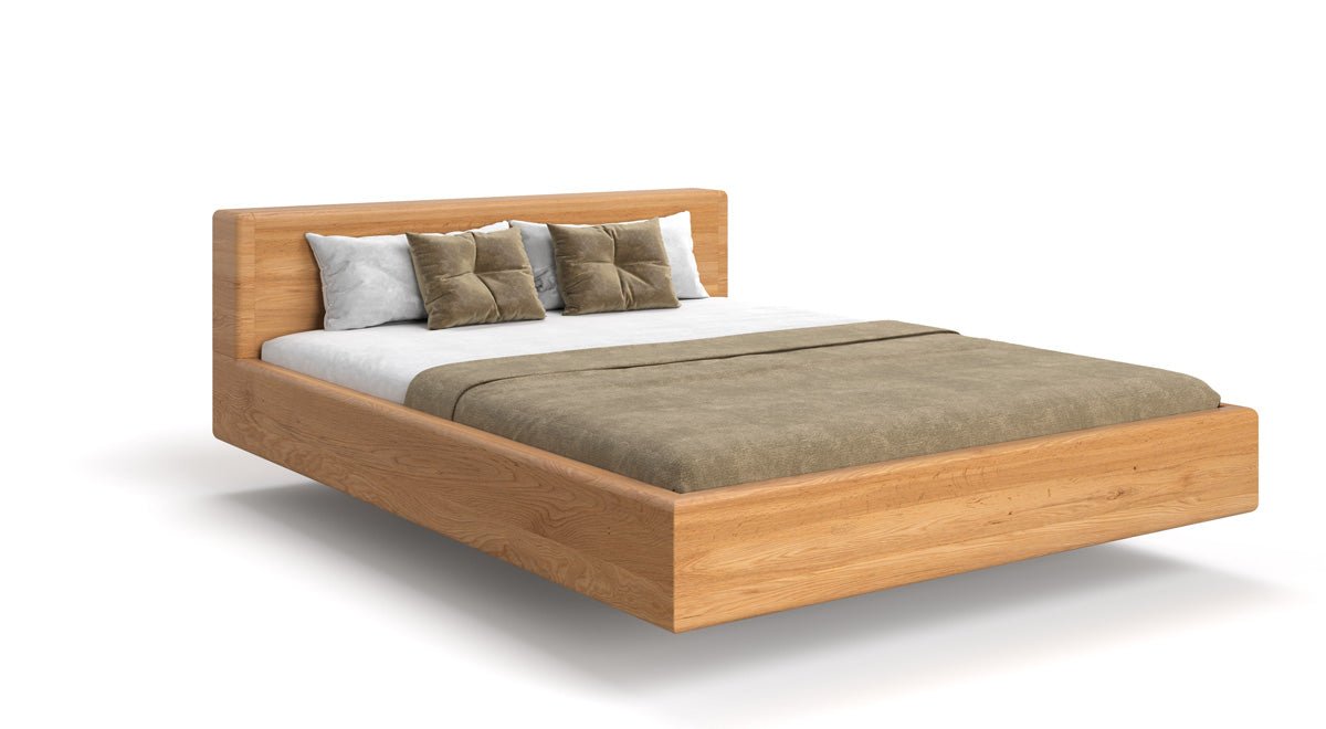 Designer Holzbett Arvelo aus massiver Eiche in Schwebeoptik und geraden Headboard
