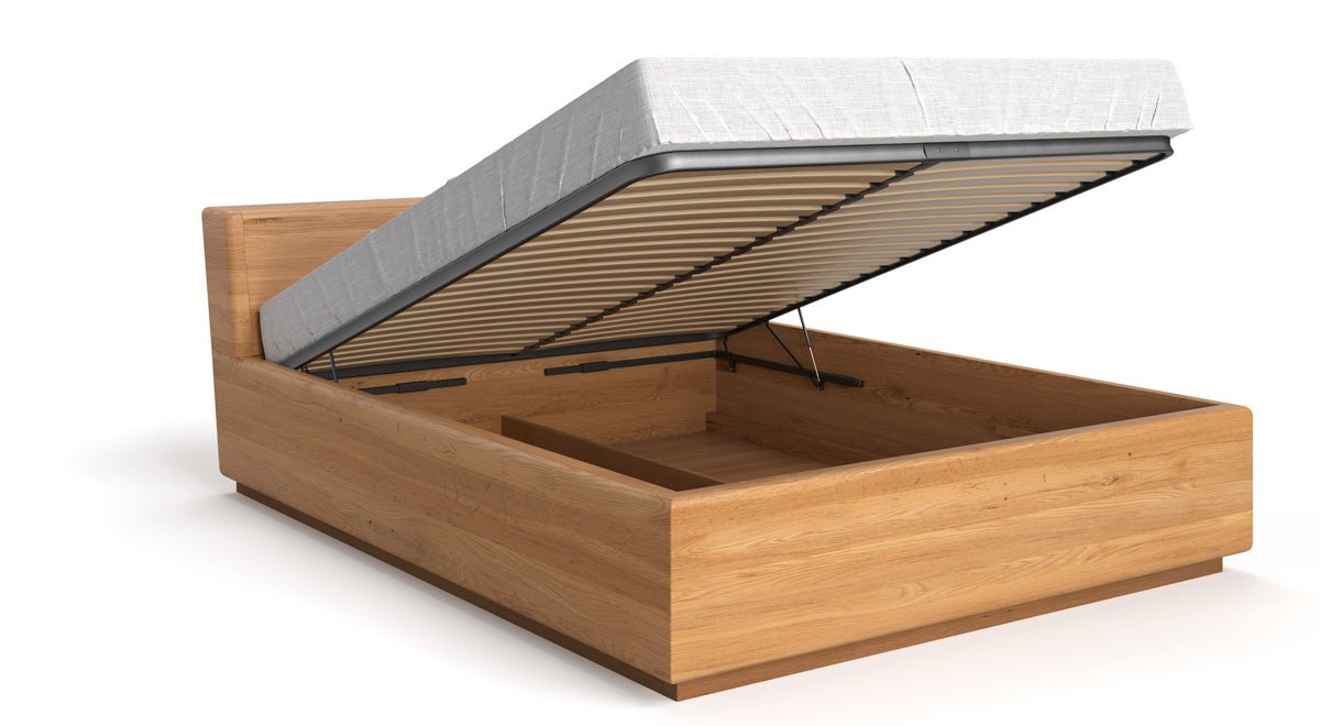 Designer wooden bed Calveno made of solid Oak with storage and slanted headboard