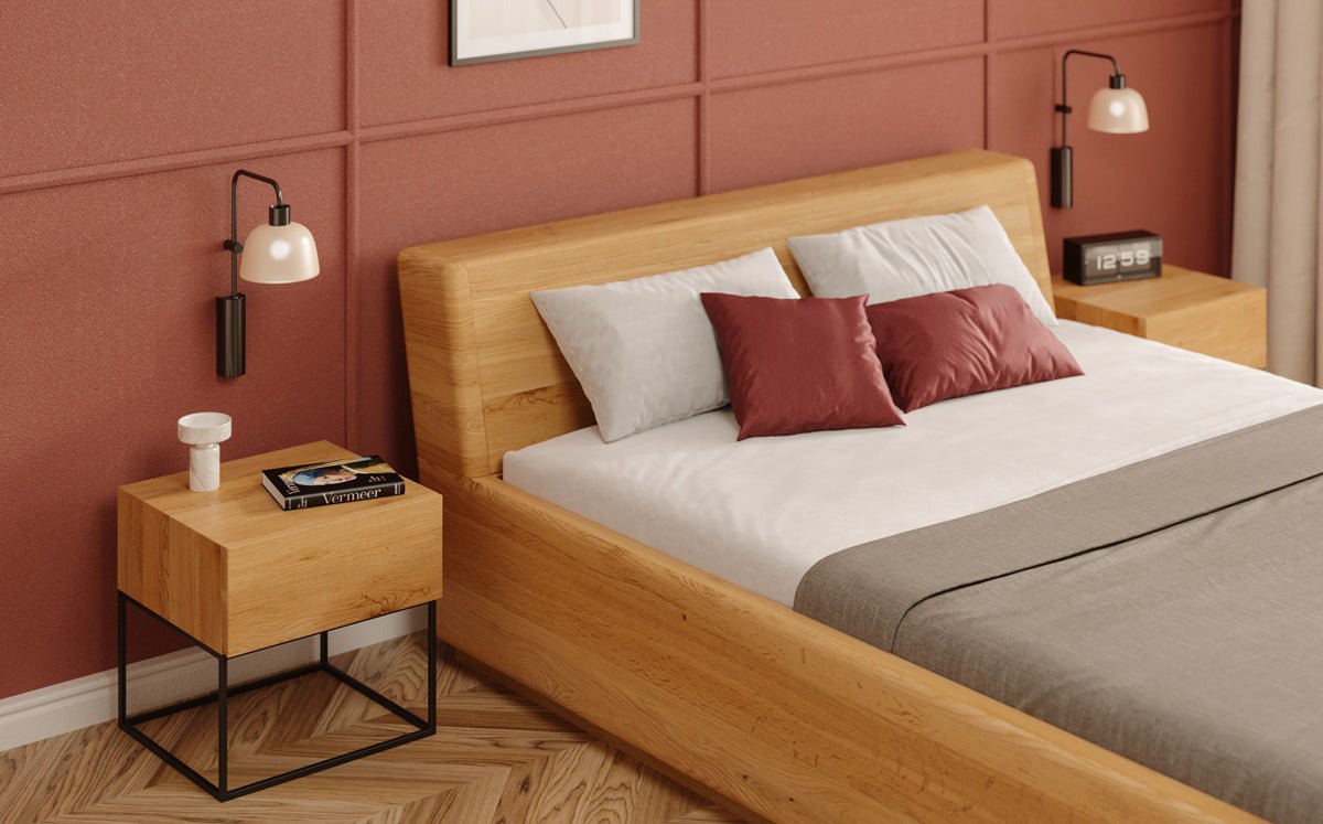Designer wooden bed Calveno made of solid Oak with storage and slanted headboard