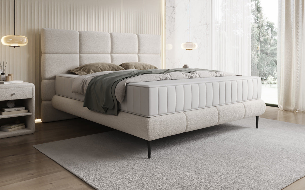 Nessa box spring bed with high legs in teddy bouclé