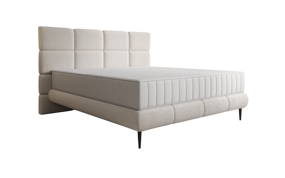 Nessa box spring bed with high legs in teddy bouclé